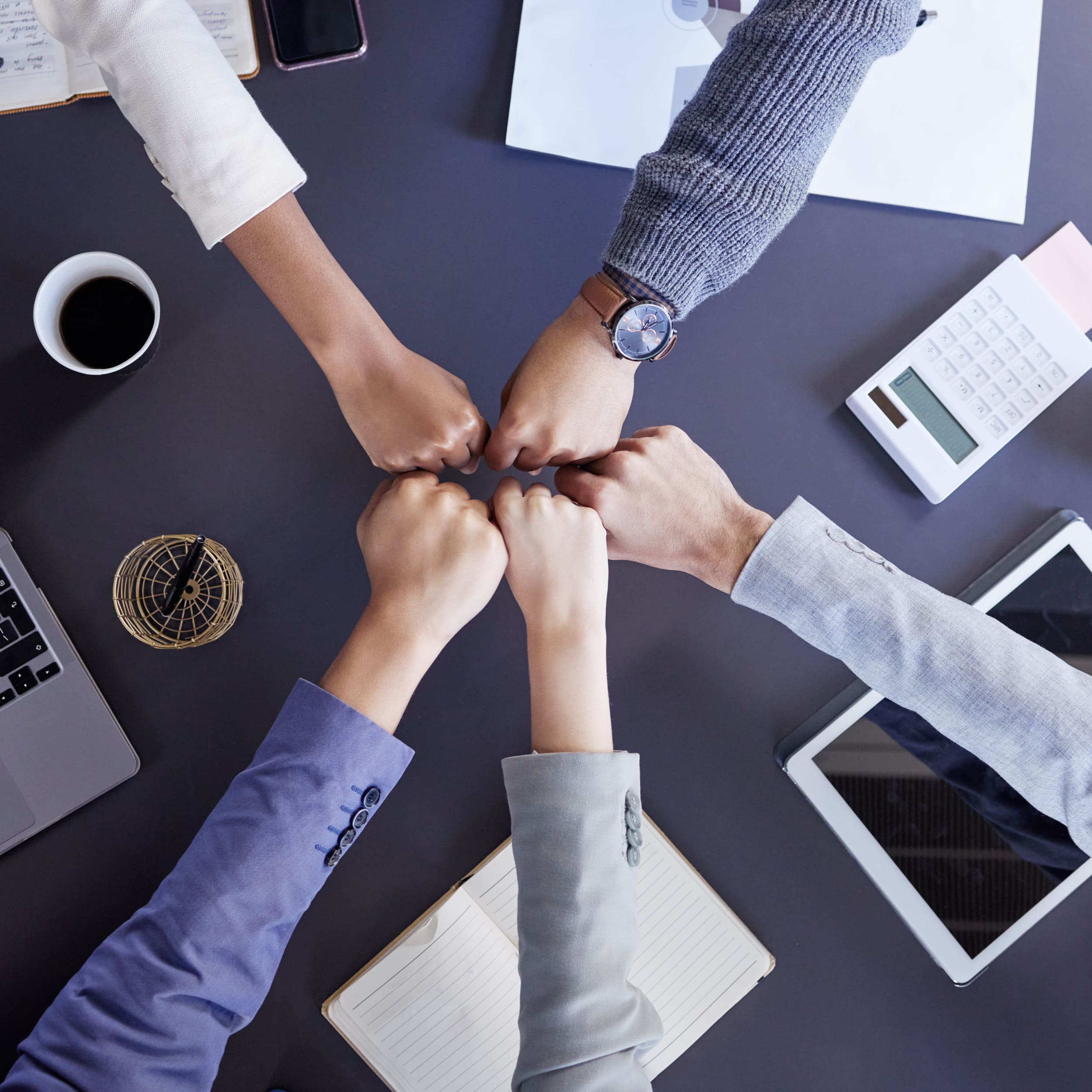 fist-bump-business-people-office-meeting-with-planning-synergy-teamwork-collaboration-hands-trust-financial-company-with-documents-partnership-with-technology